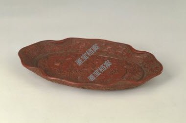 明宣德剔紅雙螭紋荷葉式盤